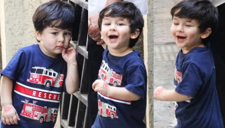 taimur ali khan playing with the media
